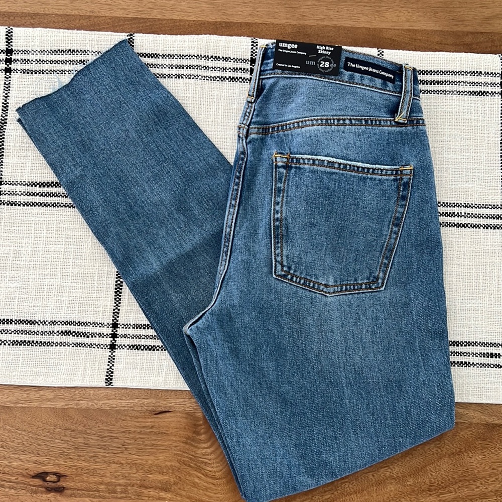 Brand New with Tags Umgee High Rise Skinny Jeans with  Trendy Frayed Bottom!